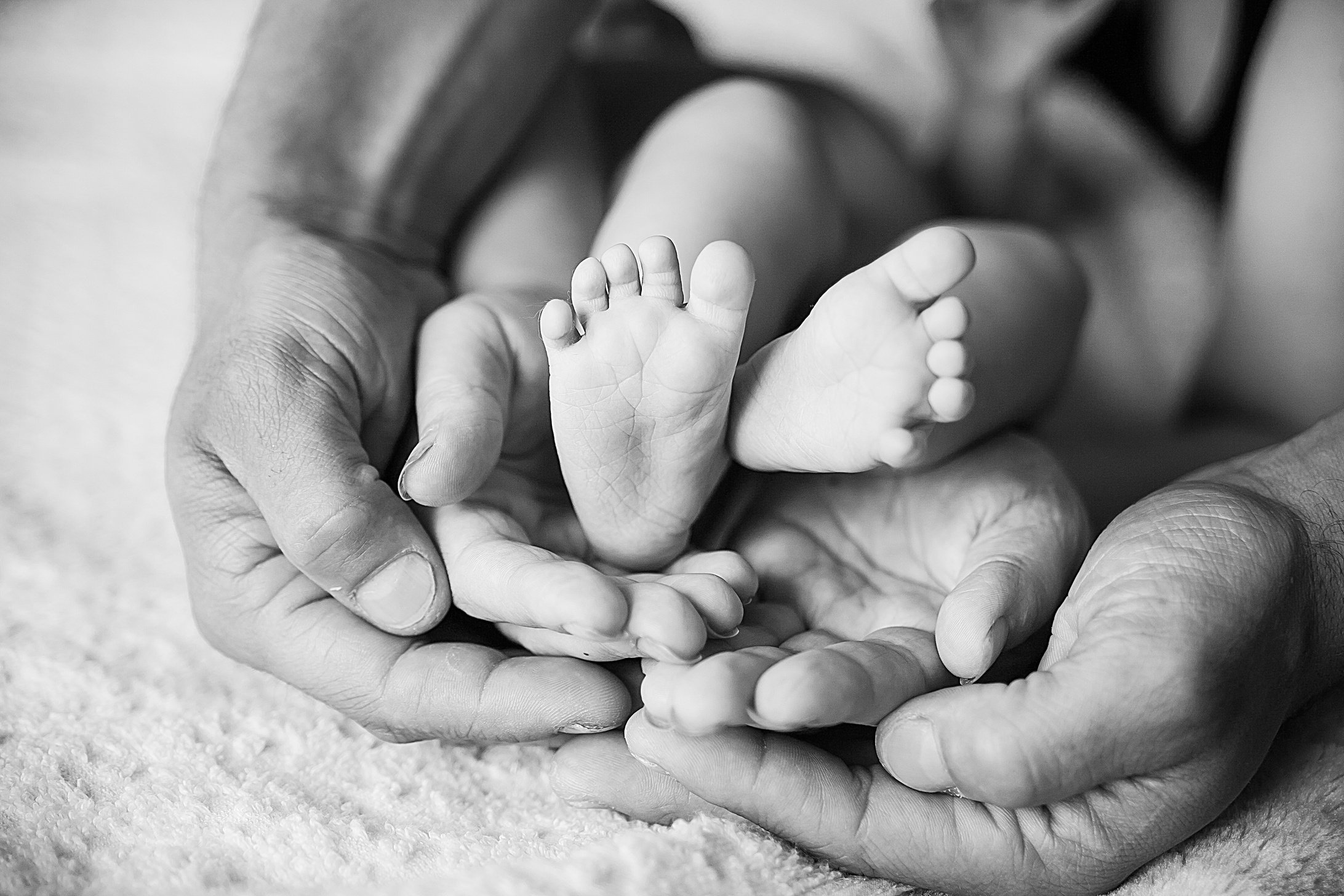 Children's feet in black white